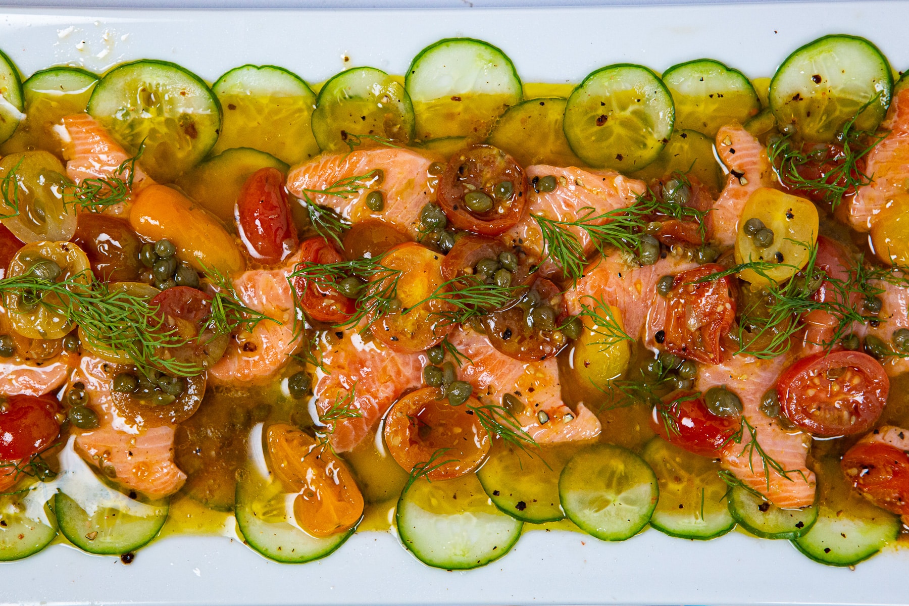 Salmon Crudo w/ Citrus Tomato Vinaigrette