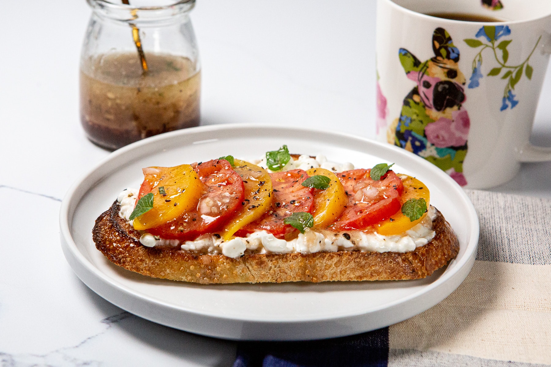 cottage cheese toast, southern caprese, cottage cheese toast with tomatoes peaches and mint