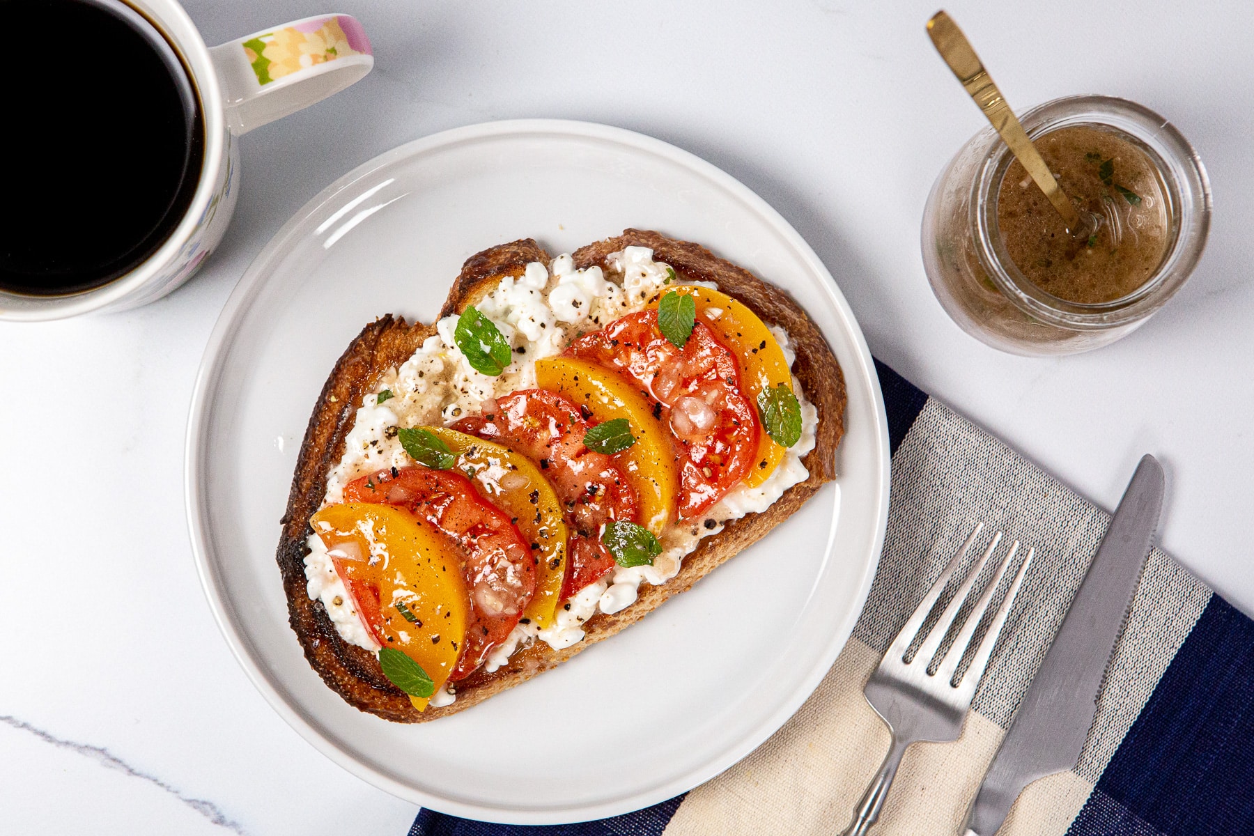cottage cheese toast, southern caprese, cottage cheese toast with tomatoes peaches and mint