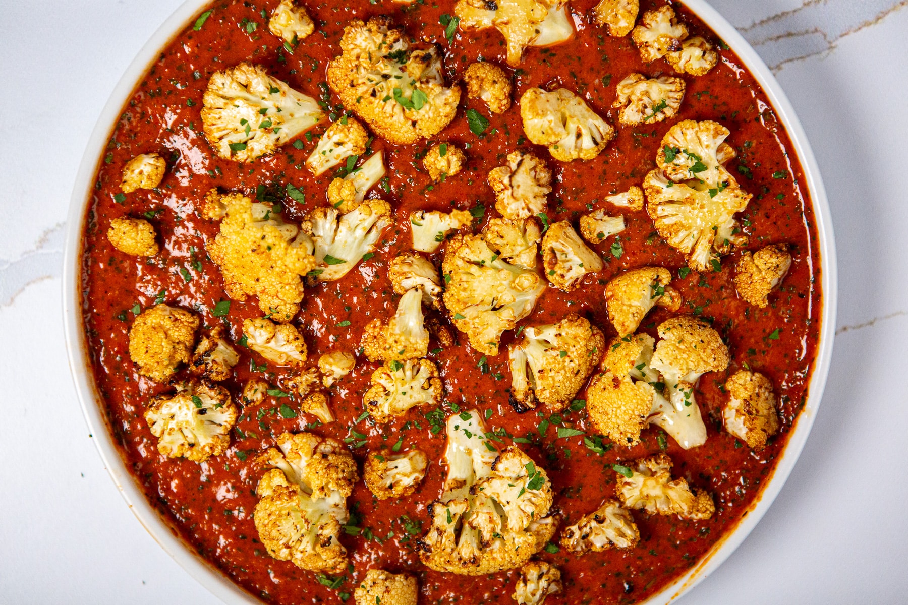 Air fryer cauliflower steaks, air fryer cauliflower, air fried cauliflower steaks, cauliflower steaks with red chimichurri sauce, cauliflower recipe, air fried cauliflower recipe, how to make cauliflower in the air fryer,