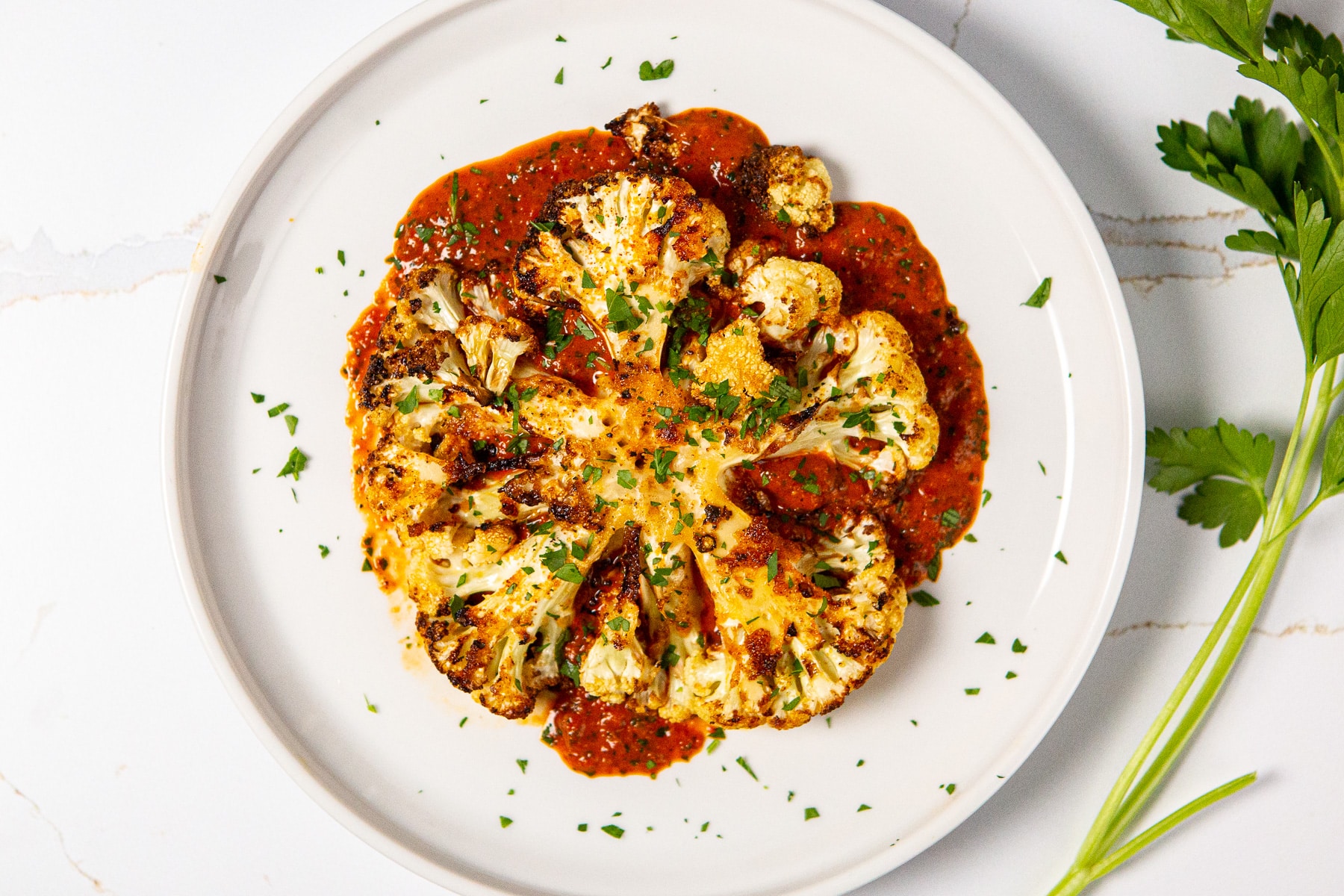 Air fryer cauliflower steaks, air fryer cauliflower, air fried cauliflower steaks, cauliflower steaks with red chimichurri sauce, cauliflower recipe, air fried cauliflower recipe, how to make cauliflower in the air fryer,